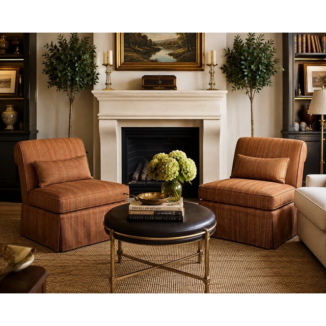 A beautifully preserved pair of Drexel Heritage oversized slipper lounge chairs, American made and documented by their...