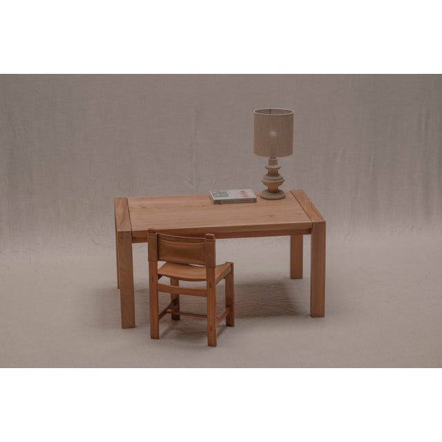 Beautiful French desk set from the 1970s, consisting of a solid elm table and its matching chair. Produced by Maison...