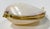 Stunning pearlized clam shell trinket box. Brass frames edge of shell with a wired hinge at back and brass clasp to front....