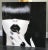 A stunning large format photography mounted on acrylic featuring a woman with jet back hair and porcelain skin-- very...