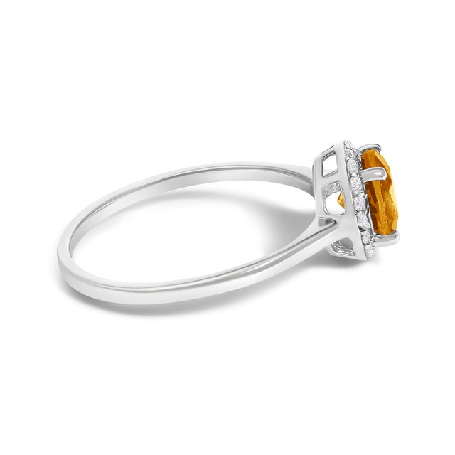 Adorn your hand with the splendor of rich, velvety orange captured in a mesmerizing 6x6 mm citrine, its fiery hues...