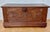 Beautiful antique Spanish wooden chest dating from the 19th century, featuring richly carved decorative panels inspired by...