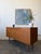 Need a solid place to hide your clutter/records/stuff?! This vintage mid-century teak compact credenza has been cleaned...