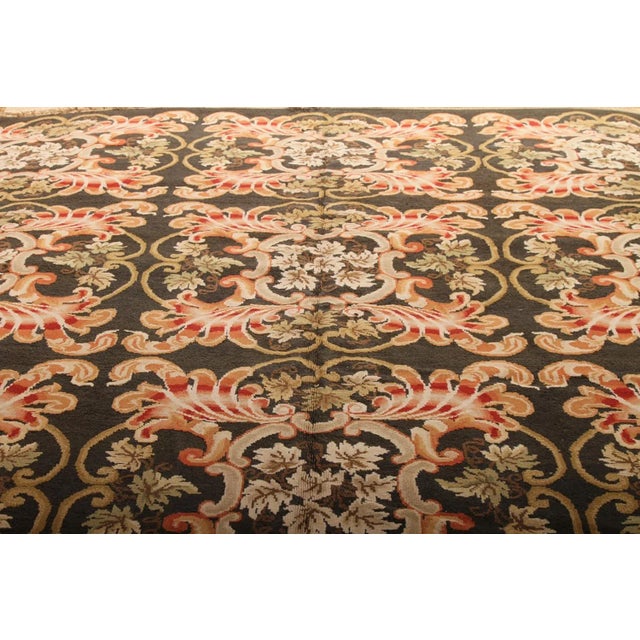 Hand knotted 9x12 wool geometric rug.