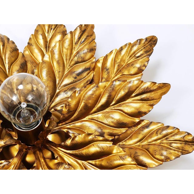 Up to two identical handcrafted decorative Florentine floral leaf lights designed by Hans Kögl / Koegl, who is also famous...