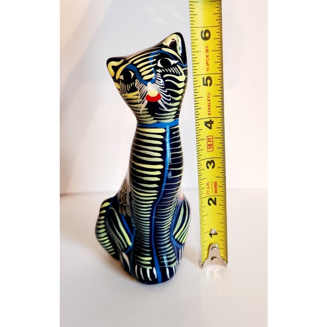 Celebrate the vibrant artistry of Mexican folk art with this **Vintage Mid-Century Modern (MCM) Talavera Hand-Painted Cat...