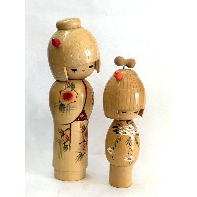 Usaburo Kokeshi (卯三郎こけし) refers to a celebrated style of sosaku (creative or modern) Japanese wooden doll. They are...