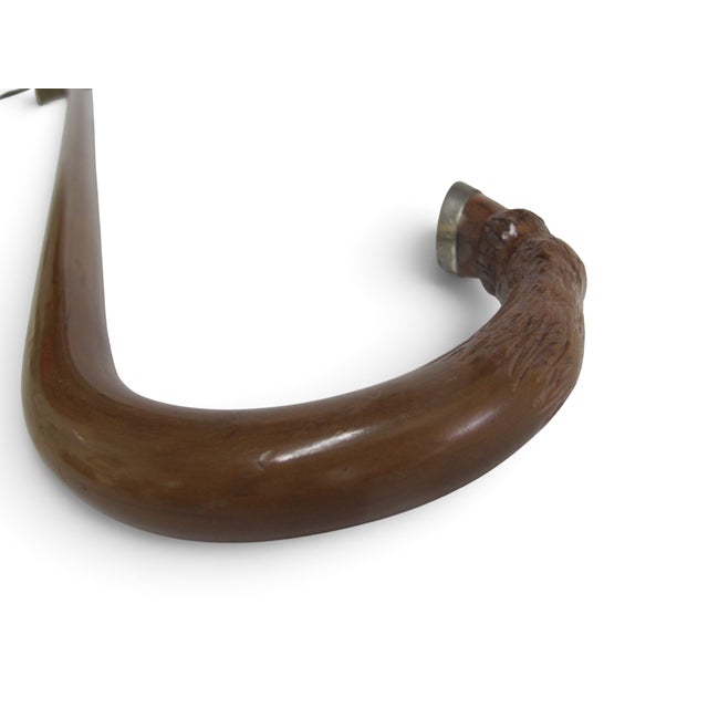 Antique wood walking stick cane with a carved crook handle resembling a deer hoof. Measures 36" x 4 1/2" x 7/8" Excellent...