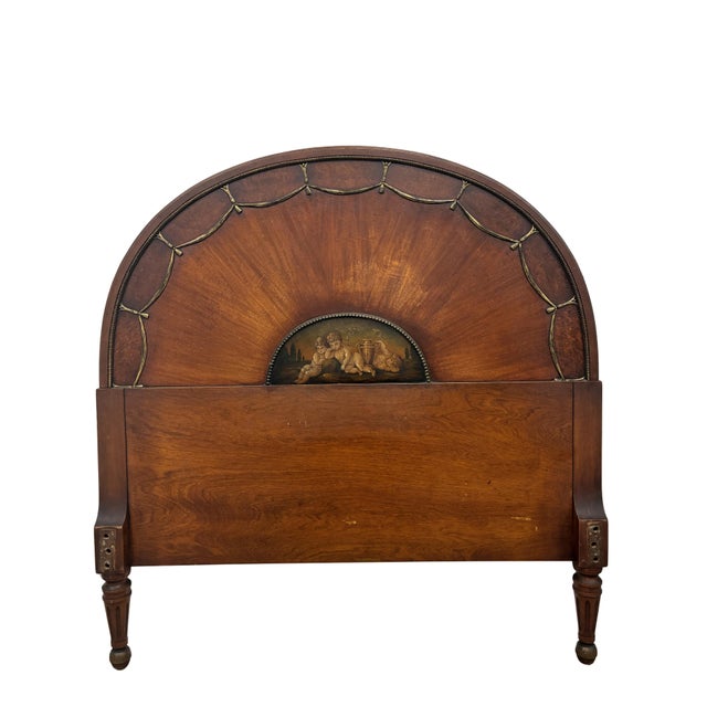 An elegant antique Neoclassical twin bed crafted in richly figured mahogany with exceptional hand-painted classical panels...
