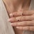 Infuse your jewelry collection with passionate warmth with this stunning cluster pendant necklace, featuring three...