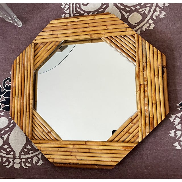 Gorgeous octagon mirror from the Raymor that works in a variety of rooms and decor styles. Makers mark is visible on back...