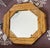 Gorgeous octagon mirror from the Raymor that works in a variety of rooms and decor styles. Makers mark is visible on back...