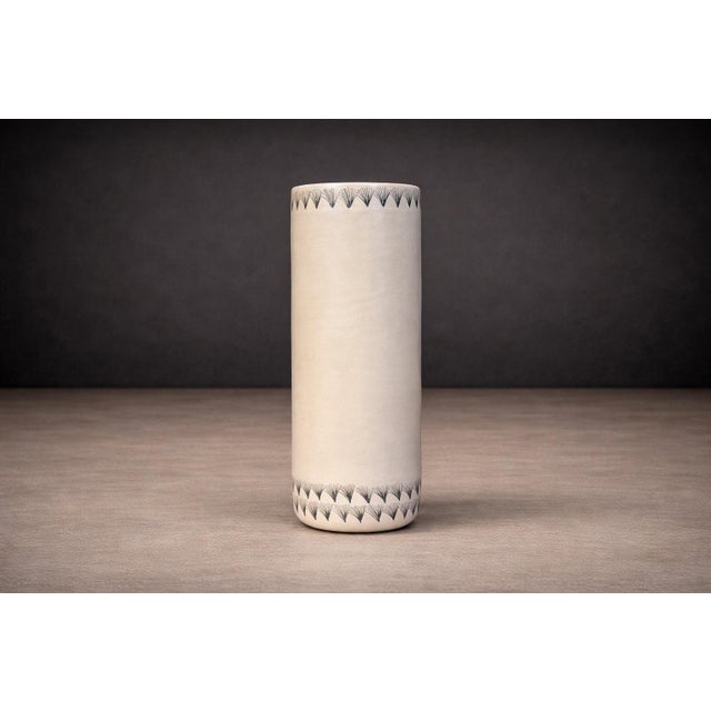 Produced by Taller Maya in collaboration with artisans of the Yucatán Peninsula, this hand-crafted vase reflects a...