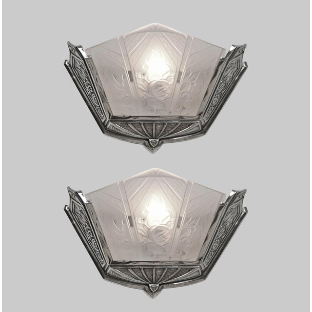 wall sconces by Vandamme & Verreries des Hanots A pair of 1925-1935 wall sconces by Louis Vandamme holding shades in clear...