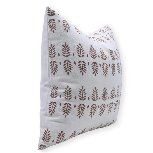 Add timeless charm to your space with the Darpan block print handmade cushion cover. Crafted from thick white cotton, this...
