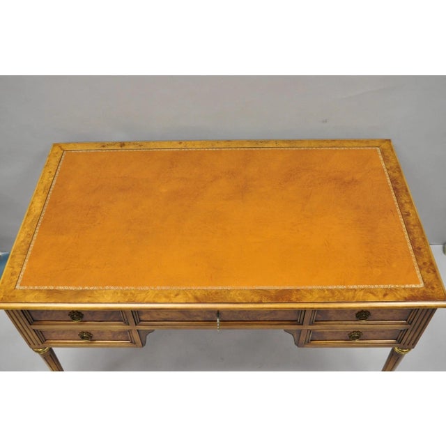 Vintage French Louis XVI Style Burl Walnut Tooled Leather Top Italian Writing Desk. Item features 5 drawers, tapered legs,...
