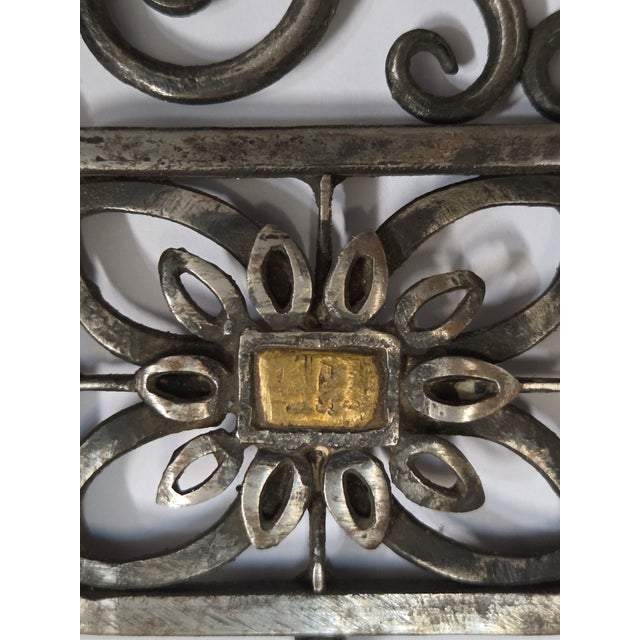 Magnificent Art Deco period rectangular wall mirror with a clean, modern profile and a slim hand hammered iron frame. The...