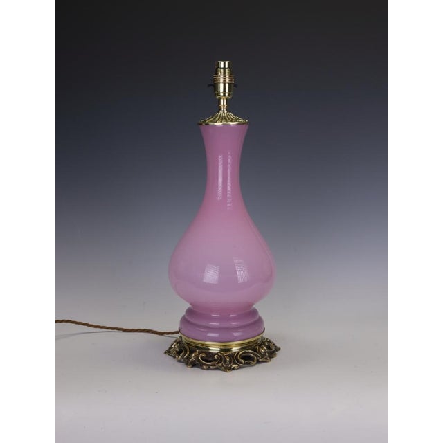 Antique 19th century french pink opaline glass baluster table lamp an exceptionally elegant and vibrant 19th-century...