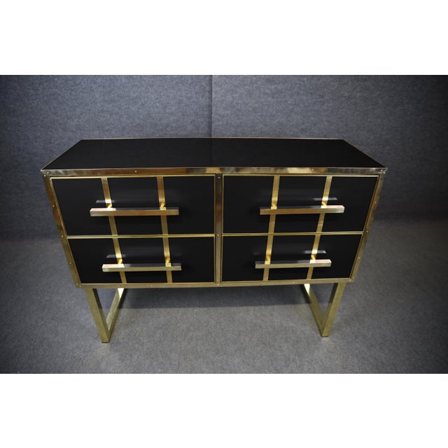 This stunning Italian chest of drawers is a masterpiece of mid-century modern design, crafted with meticulous attention to...