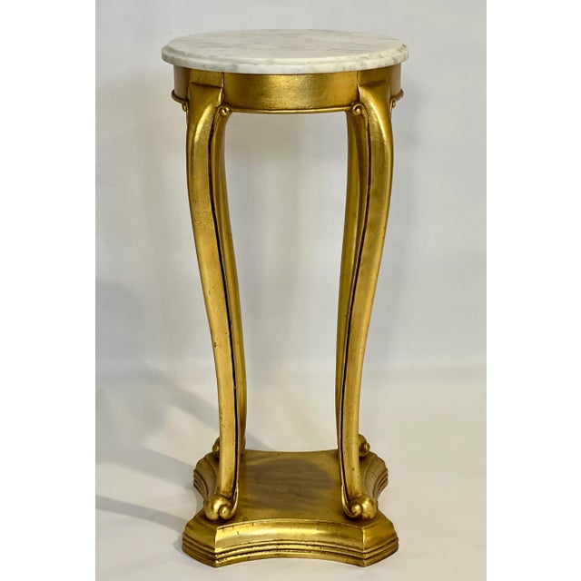 Regency style gilt wood marble top pedestal or plant stand, early 20th century. Beautiful gilt pedestal with cabriole legs...