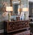 Offering a large and sophisticated pair of hand painted sage green and bronze colored ceramic table lamps with large...