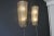 This pair of modernist Italian art glass sconces features 2 smoked and 2 frosted glass curved panels mounted on a chromed...