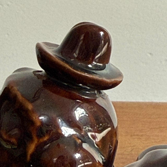 Whimsical incense burner of a dapper dog smoking pipe. Perfect for incense powder or cones, which create a fragrant smoke...