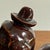 Whimsical incense burner of a dapper dog smoking pipe. Perfect for incense powder or cones, which create a fragrant smoke...