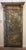 A truly exceptional and one-of-a-kind monumental architectural pier mirror, salvaged from a 19th-century door surround and...