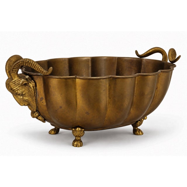 This is a late 20th century Italian neoclassical brass planters or cachepots attributed to Decorative Crafts. They have...