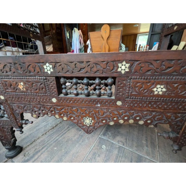 Bring exotic elegance to your home with this Moroccan Style Mother of Pearl Inlay Entry Bench. Handcrafted with exquisite...