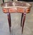 Such a classic, this French kidney shape petit table on tapered cabriole legs, brass adornments throughout, cinnamon...