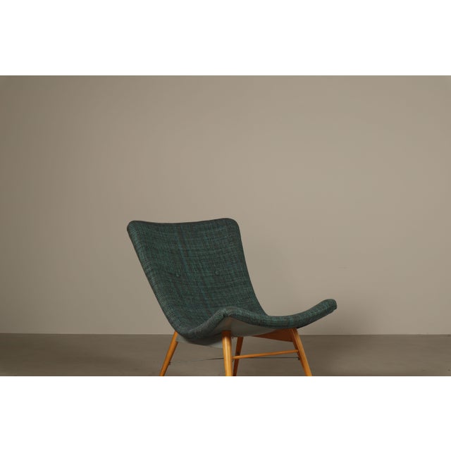A distinctive pair of lounge chairs designed by miroslav navrátil for český nábytek in former czechoslovakia, circa 1959....