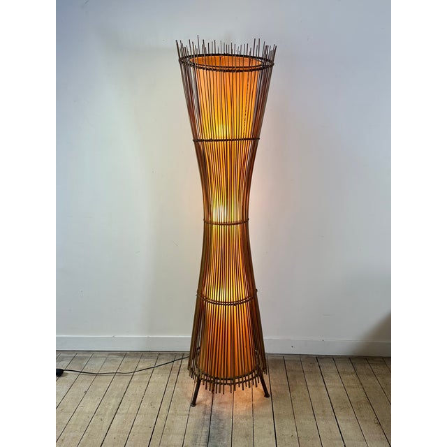 Vintage Kobe floor lamp from the 1990s, featuring an elegant hourglass silhouette characteristic of the organic design of...