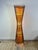 Vintage Kobe floor lamp from the 1990s, featuring an elegant hourglass silhouette characteristic of the organic design of...
