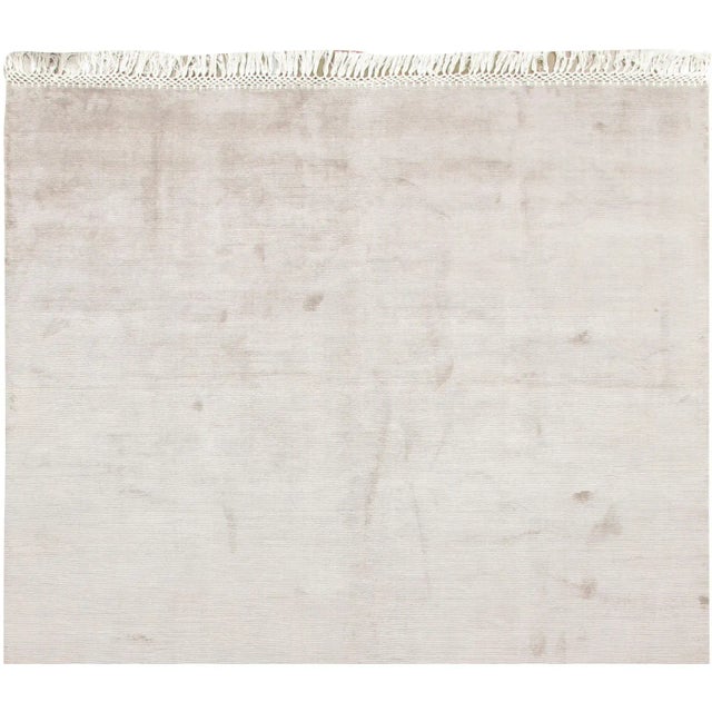 This wonderful new rug is in grey with the end fringes complimenting the rug in ivory to create this special look. Hand...