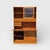 Mid-Century Teak Bookcase with Drop-Front Desk and Lighting. A tall teak wall unit combining open shelving, a drop-front...