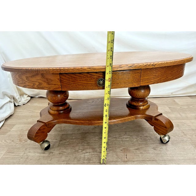 Oval Coffee Table Tiger Oak, Center Drawer, Shelf, Empire Style, Caster Wheels For Sale - Image 10 of 13
