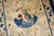 An early 20th-century pretty floral Chinese rug in beige and Blue