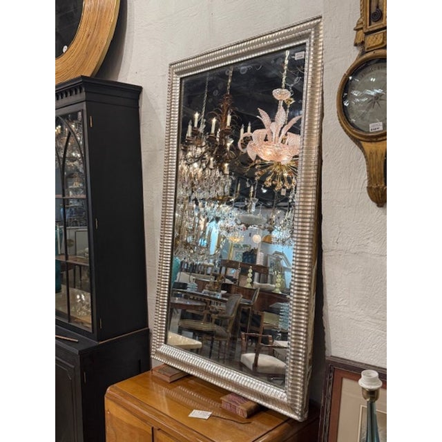 The 19th Century Traditional Silver Louis Philippe Mirror is an antique piece that exudes elegance and sophistication. The...