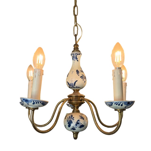 An elegant mid-century Dutch Flemish-style 5-arm chandelier, beautifully crafted from solid brass and authentic hand-...