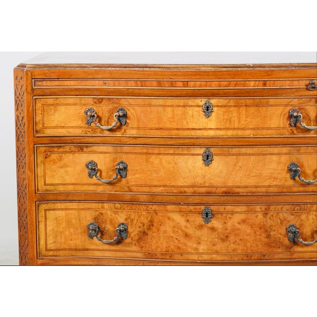 A beautifully proportioned Queen Anne Revival serpentine chest of drawers, crafted in the United States during the...