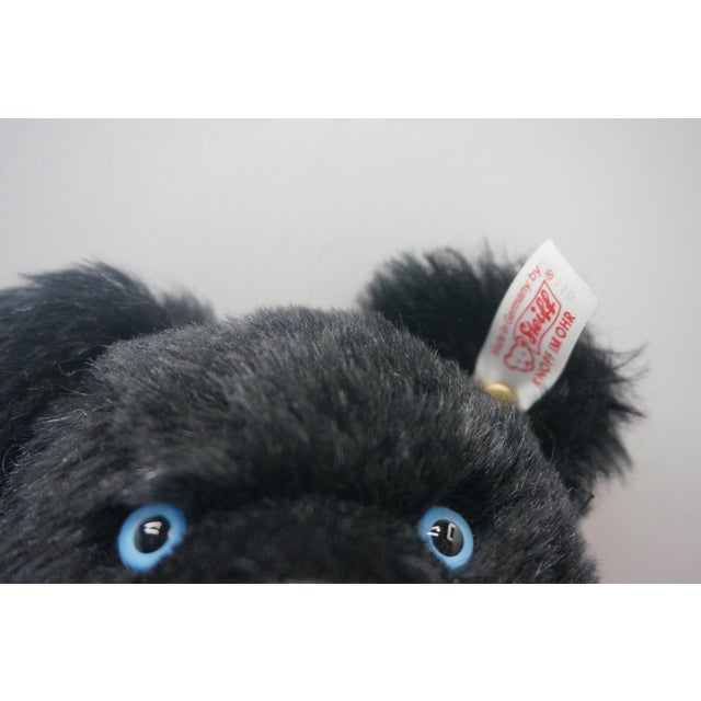 Presenting "Black Jackie," a sophisticated and rare limited edition teddy bear by the world-renowned German maker, Steiff....