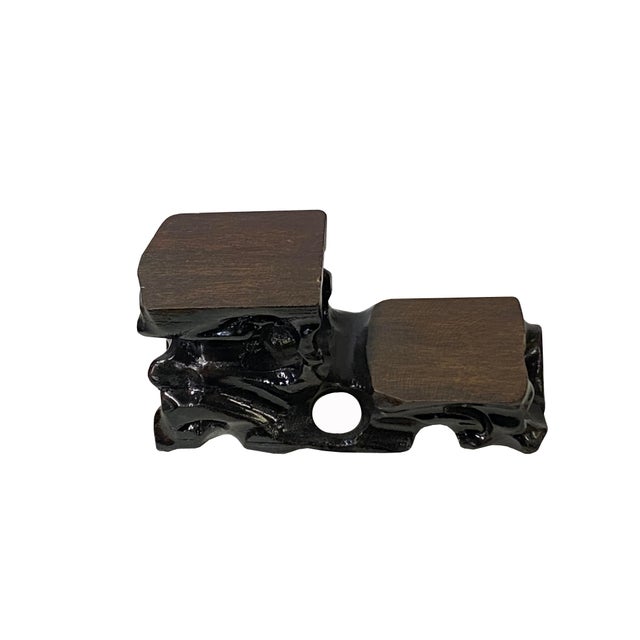 Enhance your display collection with this exquisite miniature two-tier stand, masterfully carved with organic,...
