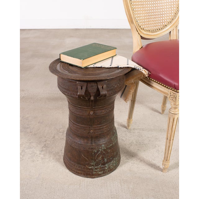 Handsome and rare petite Dong Son-style Southeast Asian patinated cast bronze pedestal form rain drum that could serve as...