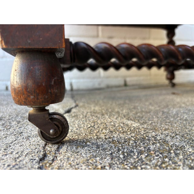 Antique Oak Bergere Armchair Featuring Barley Twist Legs, Arms, and Stretchers, With Cane Paneling Sides and Caster Wheels For Sale - Image 9 of 11