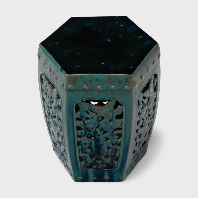 Sculptural and drenched in color, this ceramic garden table reinvents the barrel shape of classic Chinese drum stools....