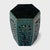 Sculptural and drenched in color, this ceramic garden table reinvents the barrel shape of classic Chinese drum stools....