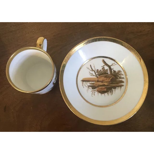 Pair antique early 19th c. Paris porcelain coffee cans and saucers by La Courtille, circa 1805. Each decorated with hand...