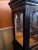 Liquor Display Cabinet with a mirrored Back in a Rich Mahogany Finish . Storage Cabinets Below with Drawers and a nice...